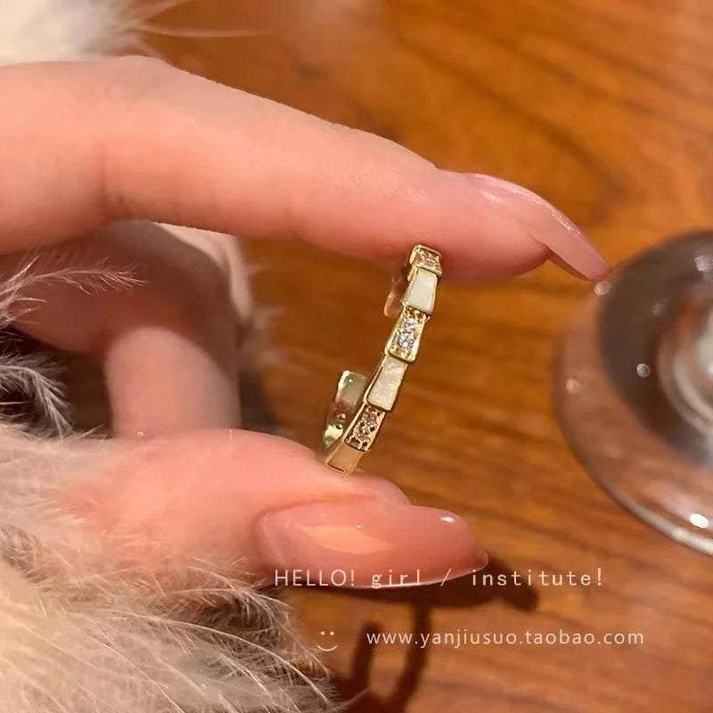 Pretty golden color crystal adjustable ring