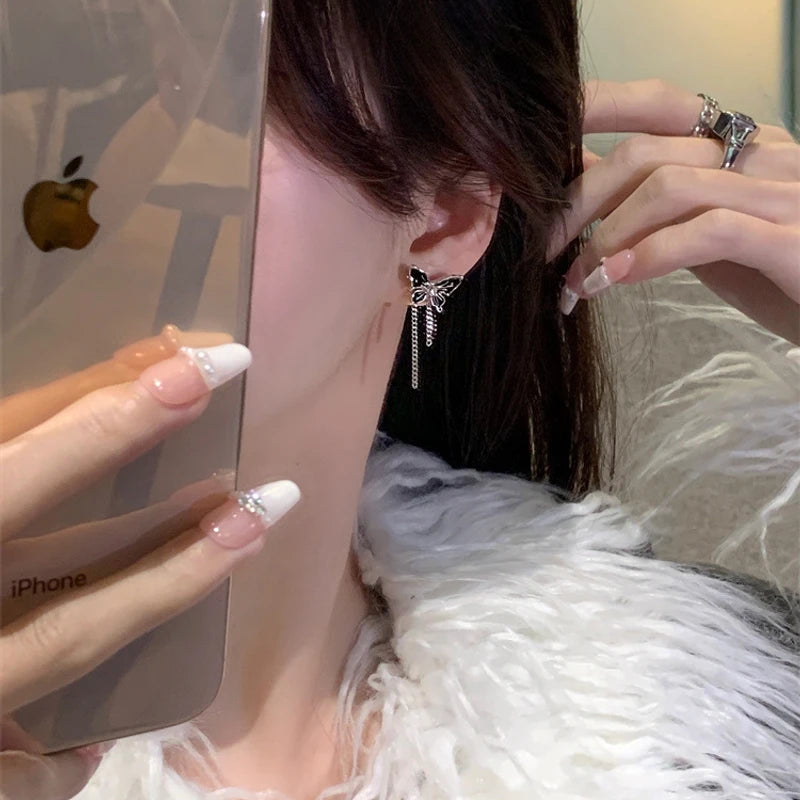 Pretty black color butterfly tassel earrings