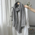 Stunning Light Gray Summer-Friendly Long Cotton Imported Hijab Finished With Hanging Leaves Tassel Fringes Along The Borders