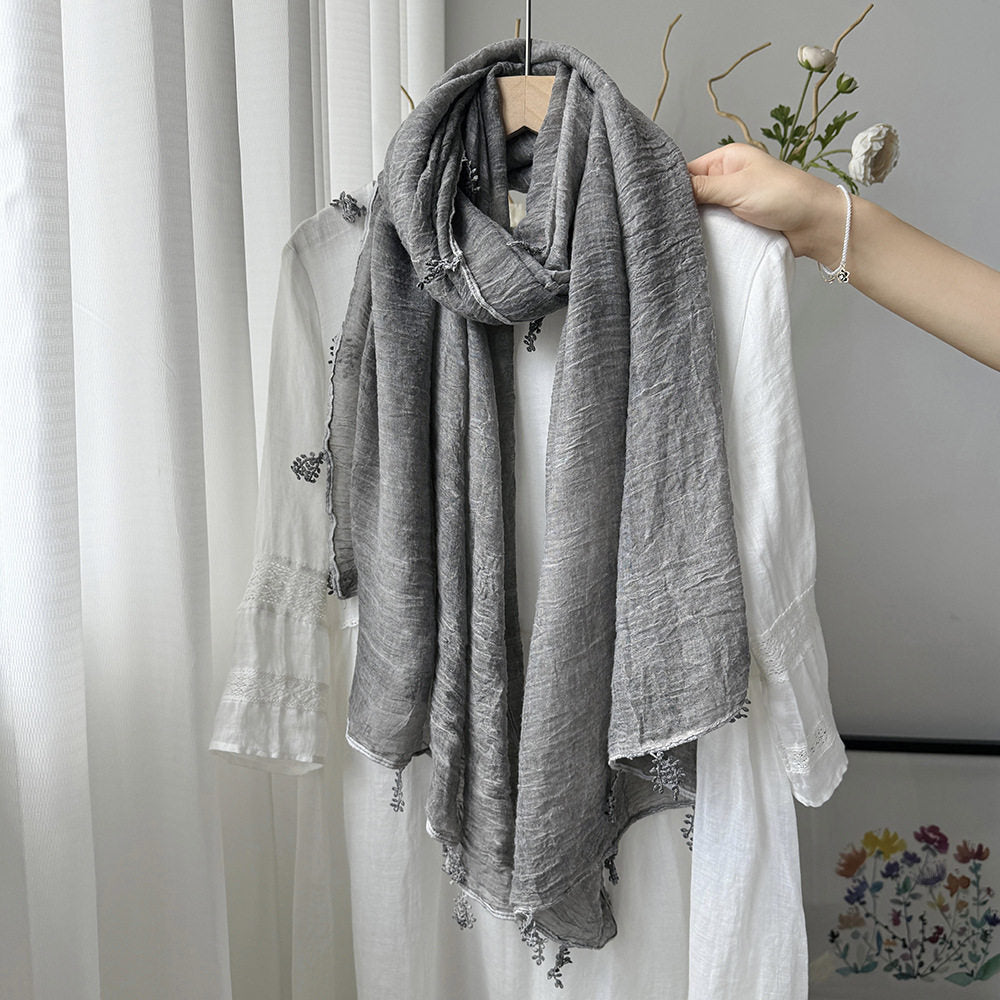 Stunning Light Gray Summer-Friendly Long Cotton Imported Hijab Finished With Hanging Leaves Tassel Fringes Along The Borders