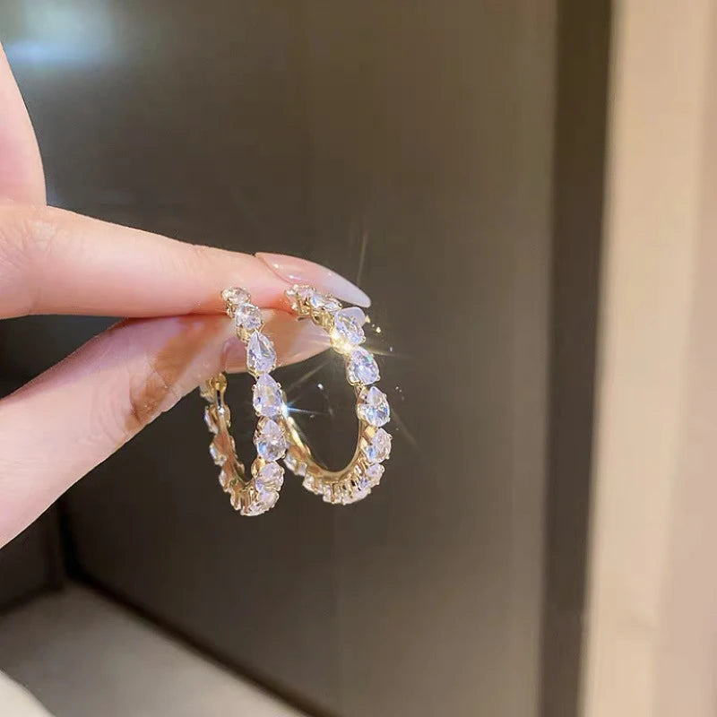 Sophisticated white hoop women's earrings