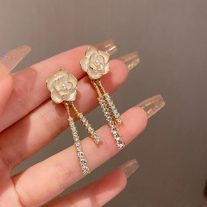 Pretty camelia tassel earrings
