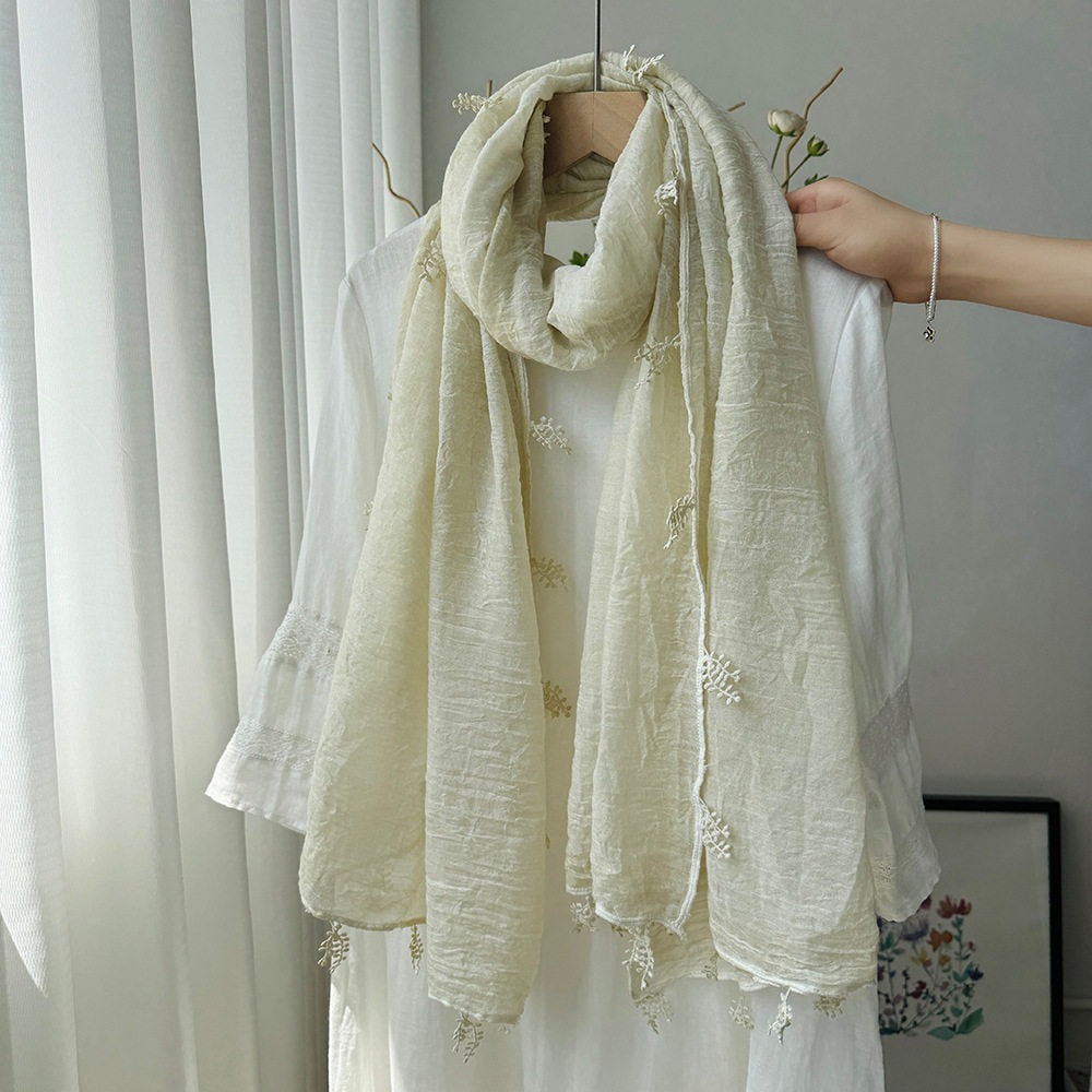 Sophisticated Milky White Summer-Friendly Long Cotton Imported Hijab Finished With Hanging Leaves Tassel Fringes Along The Borders