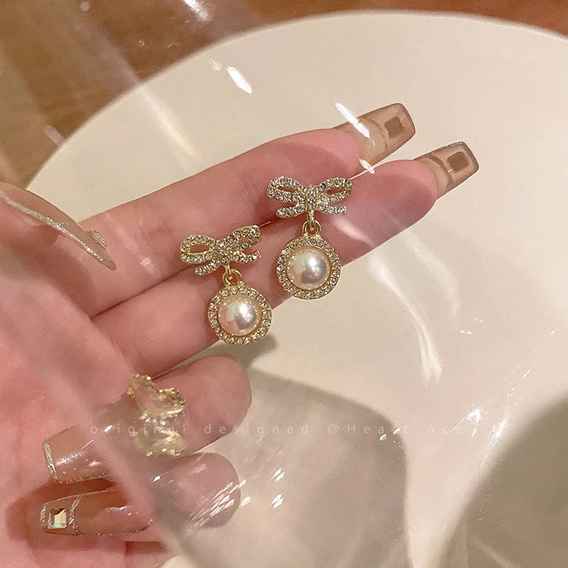 Elegant pearl bow shaped earrings