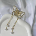 Sophisticated white color tassel claw clip