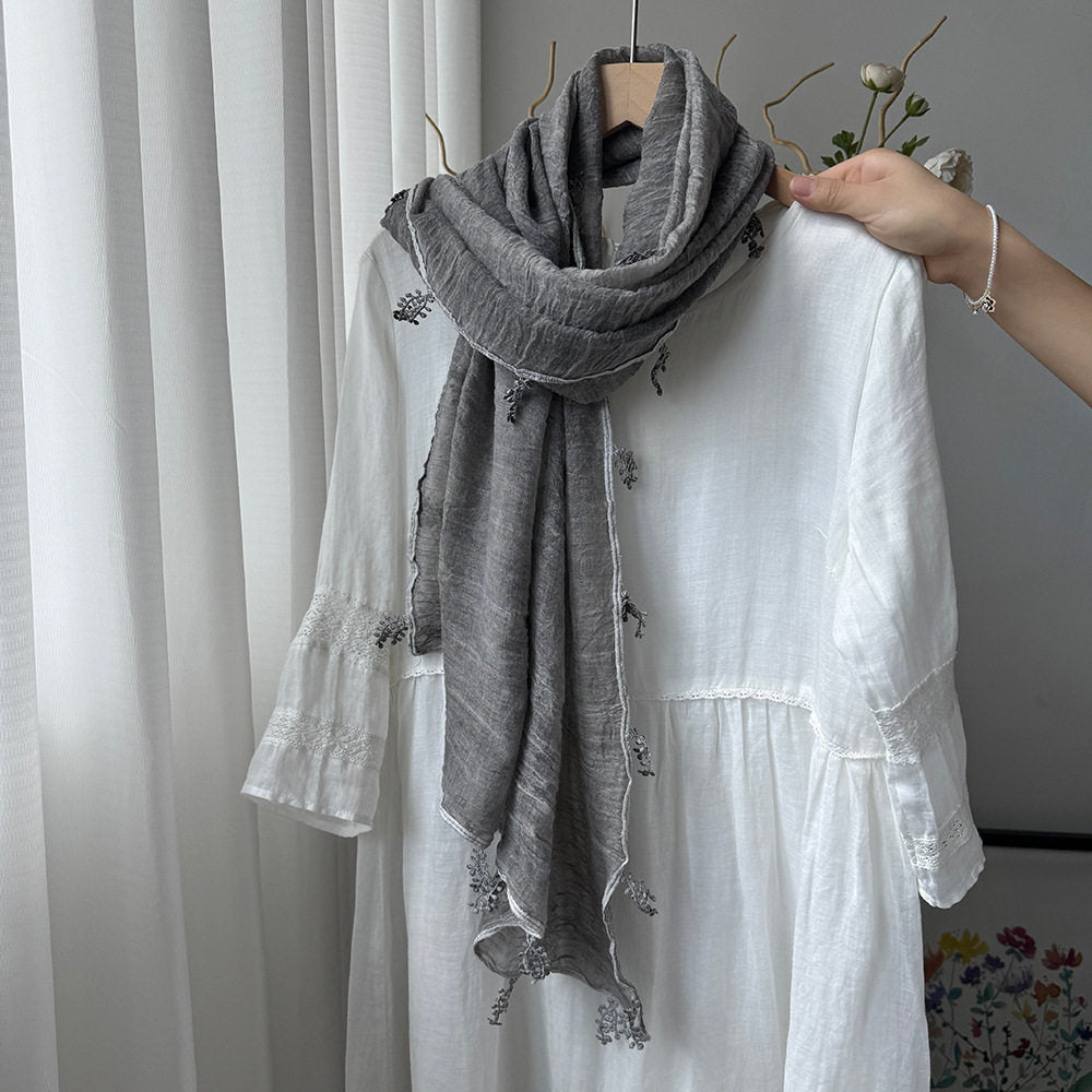 Stunning Light Gray Summer-Friendly Long Cotton Imported Hijab Finished With Hanging Leaves Tassel Fringes Along The Borders