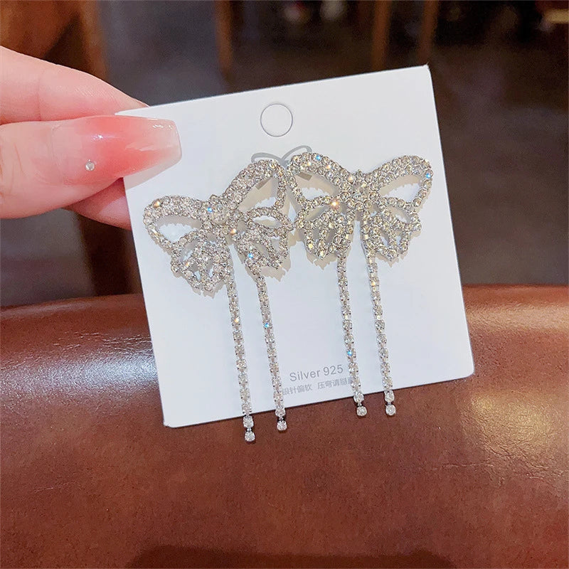 Beautiful silver color shiny tassel earrings