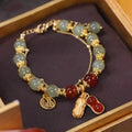 Double Red Peanut Green Bead Bracelet