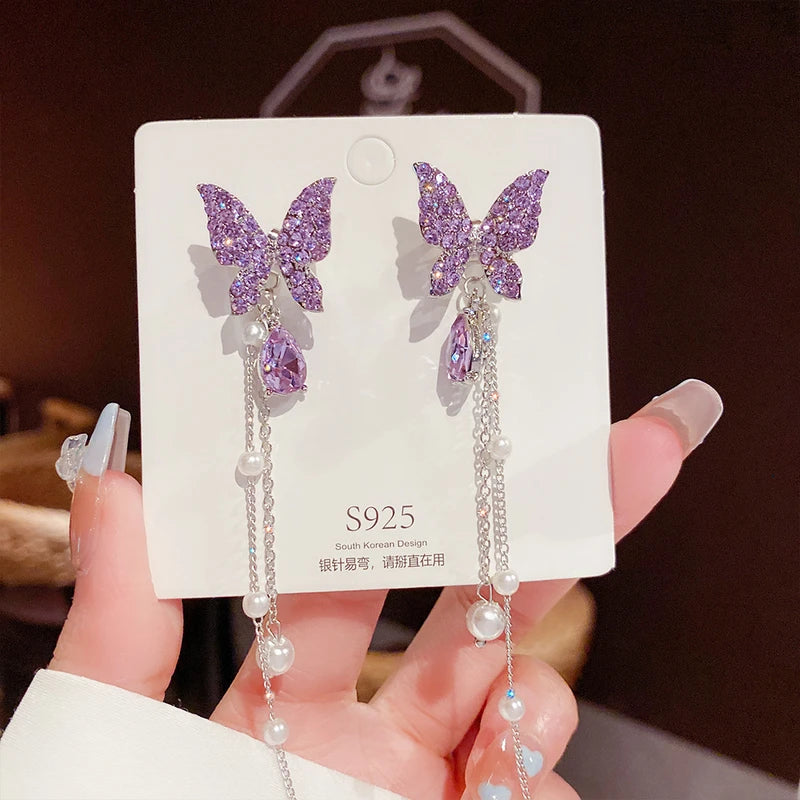 Stylish purple color crystal earrings