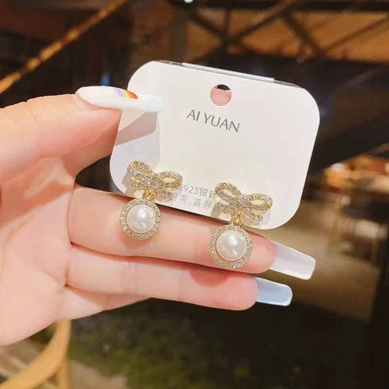 Elegant pearl bow shaped earrings