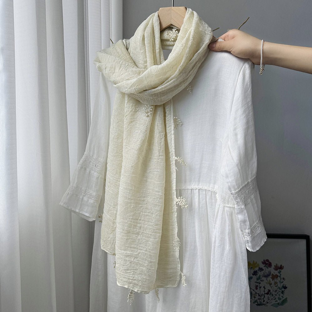 Sophisticated Milky White Summer-Friendly Long Cotton Imported Hijab Finished With Hanging Leaves Tassel Fringes Along The Borders