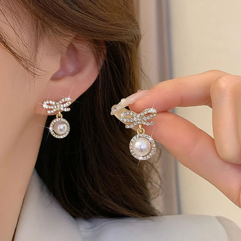 Elegant pearl bow shaped earrings
